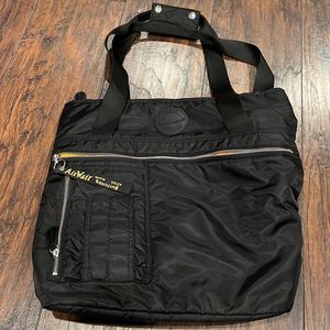  DR. Martens nylon tote converts to a backpack black with yellow interior